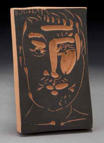 Appraisal: Pablo Picasso ''Visage d'homme'' terracotta plaque partially glazed and painted