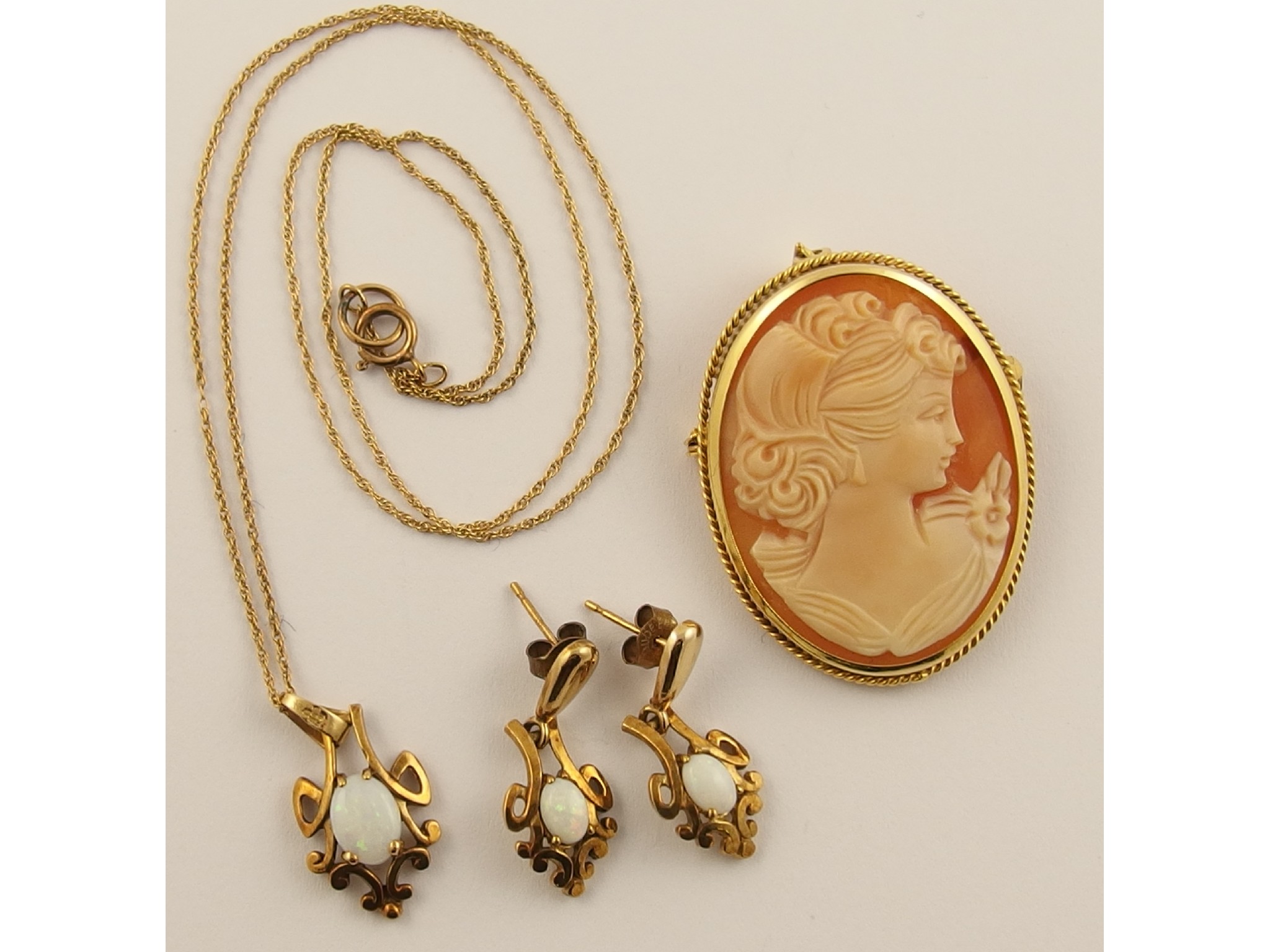 Appraisal: A ct opal necklace and earring set and a ct