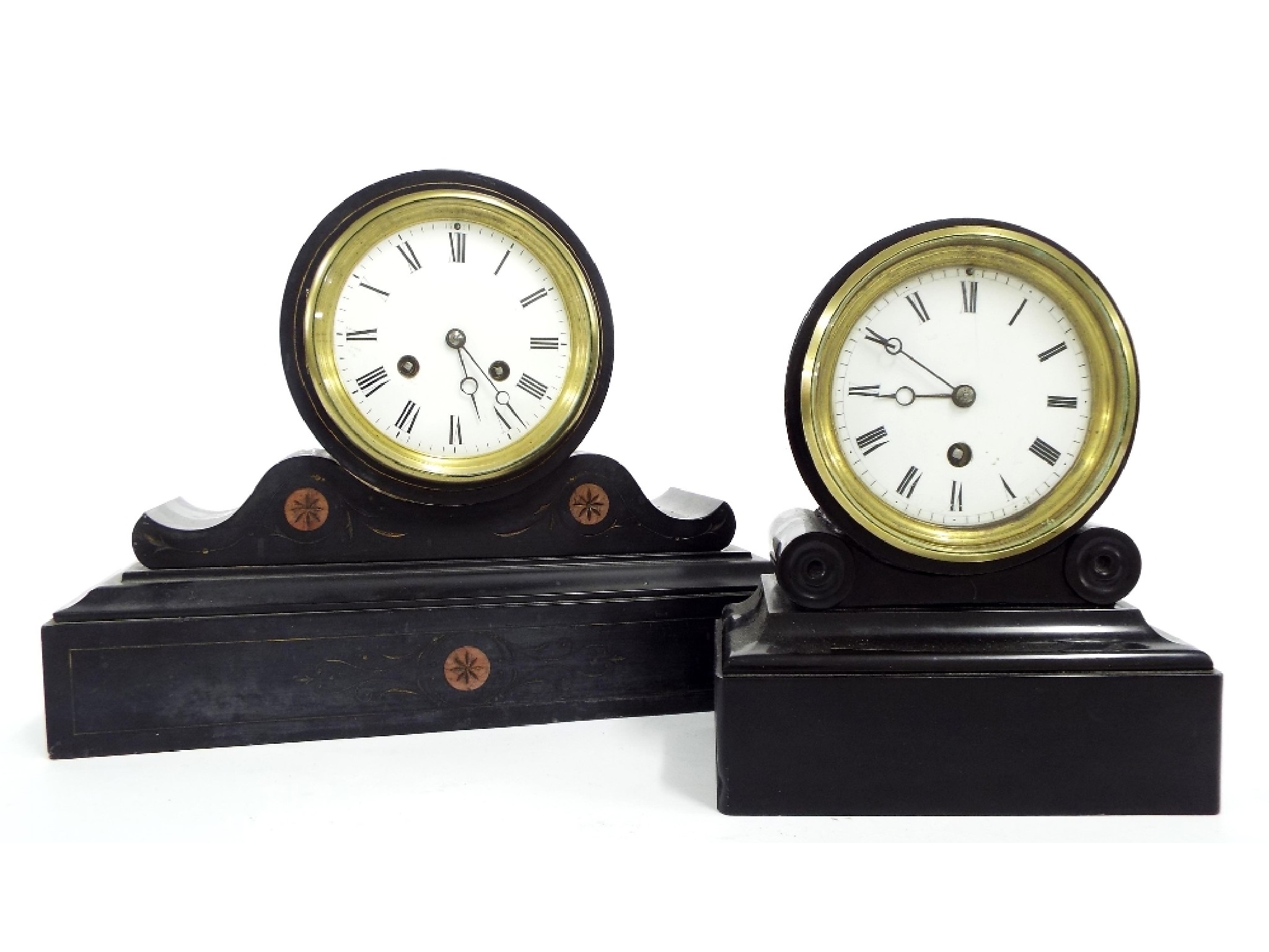 Appraisal: Black slate two train drumhead mantel clock striking on a