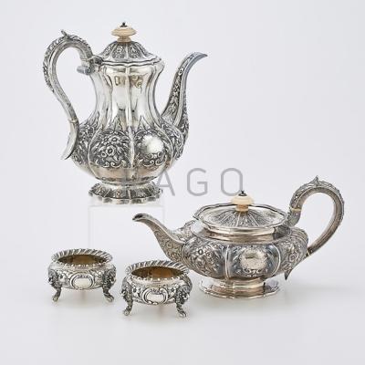 Appraisal: FOUR ORNAMENTAL ENGLISH STERLING HOLLOWARE Vertically lobed floral chased coffee