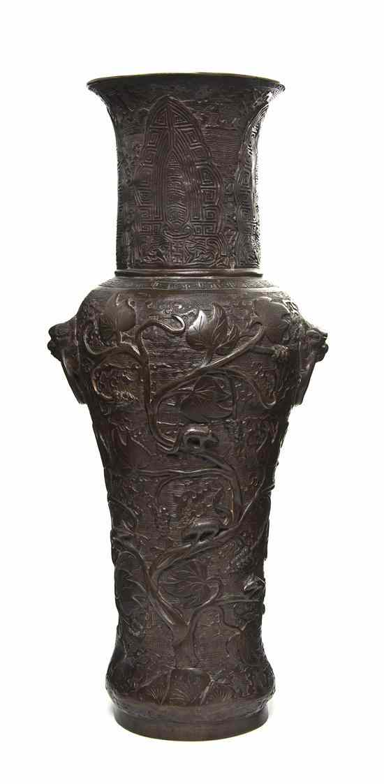 Appraisal: A Chinese Bronze Baluster Vase decorated with raised decoration of