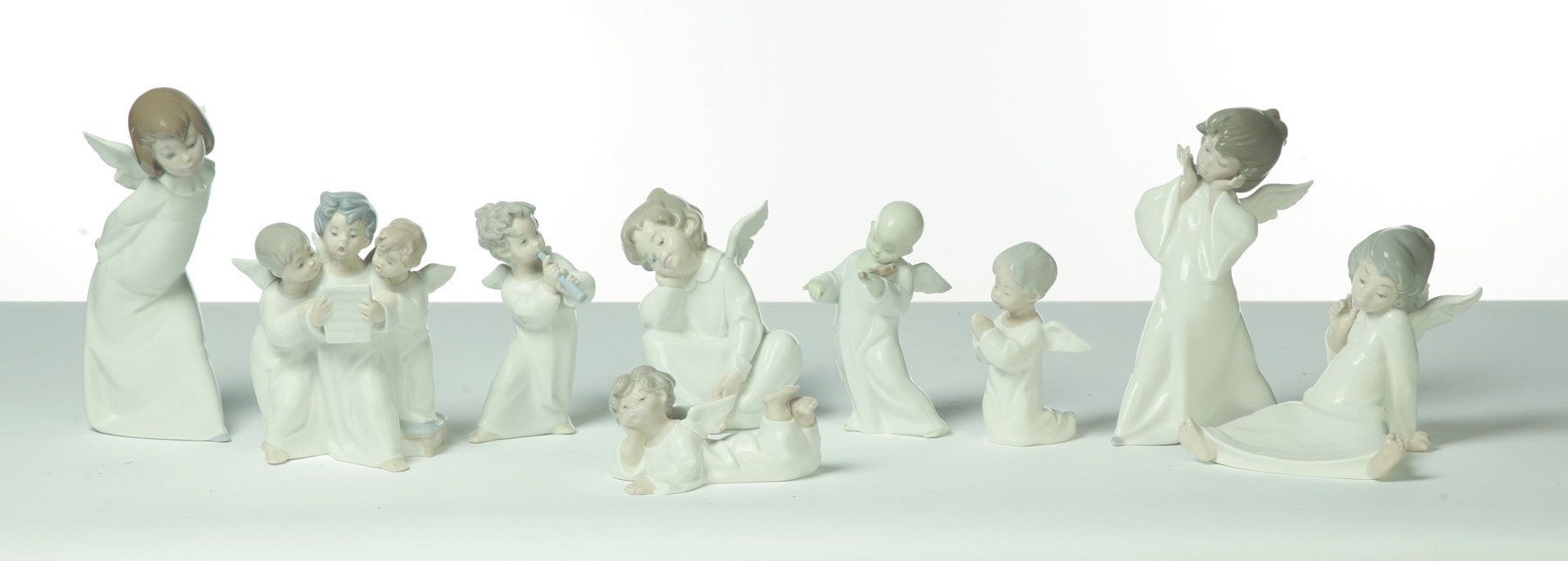 Appraisal: NINE LADRO CHERUB FIGURINES Spain th quarter- th century Various