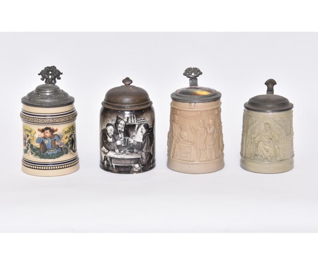 Appraisal: Four German steins two have relief figures including a king