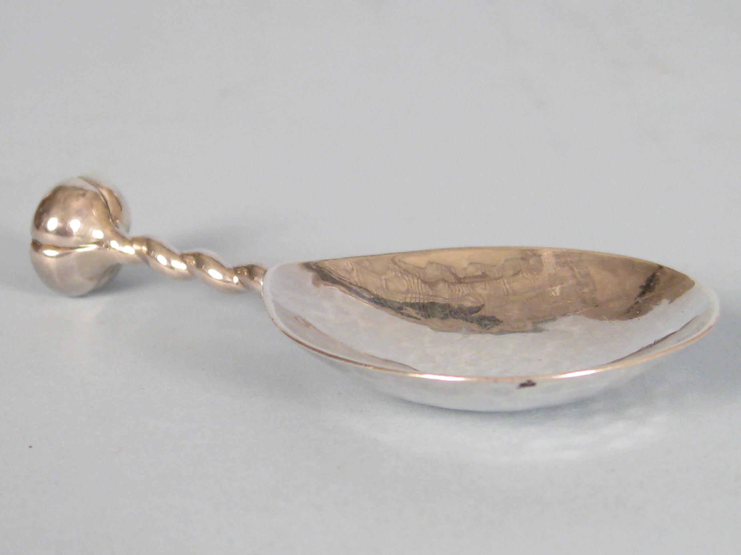 Appraisal: A George V Arts Crafts Caddy Spoon with hammered pear