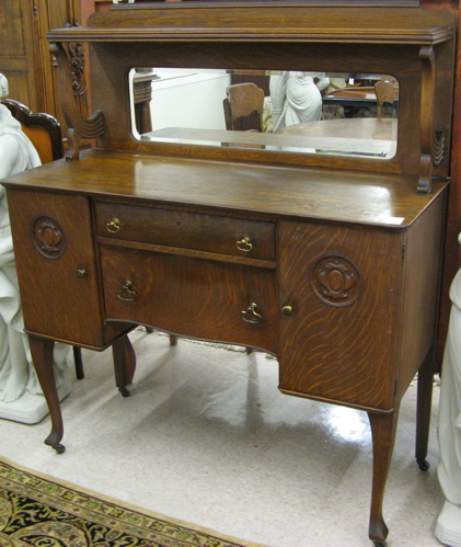 Appraisal: A LATE VICTORIAN OAK BUFFET American c having a mirror