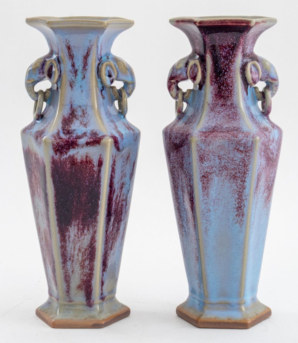 Appraisal: CHINESE FLAMBE GLAZED ELEPHANT HEAD VASES PAIR Chinese flambe glazed