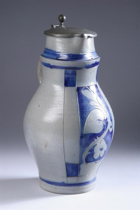 Appraisal: AMERICAN PEWTER-MOUNTED AND COBALT SLIP-DECORATED STONEWARE PITCHER th century incised