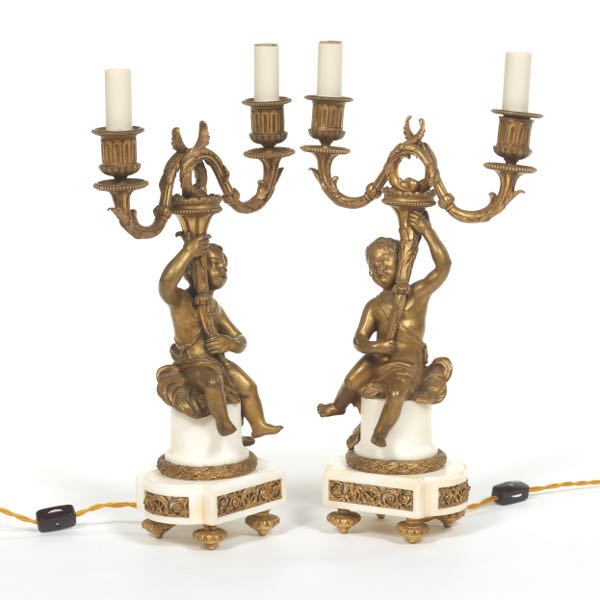 Appraisal: ANTIQUE FRENCH PAIR OF GILT BRONZE PUTTI TWIN LIGHT CANDELABRA