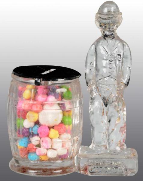 Appraisal: Glass Charlie Chaplin Candy Container Description Has original closure No