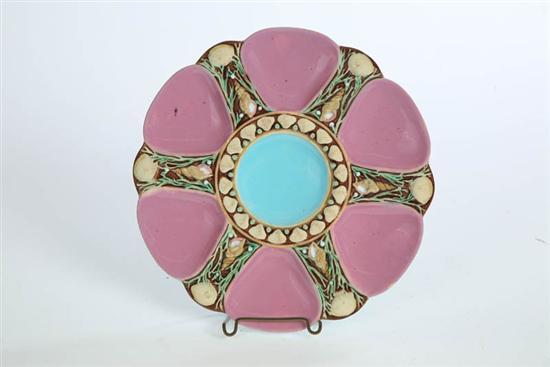 Appraisal: MINTON MAJOLICA OYSTER PLATE Six amethyst wells and blue center