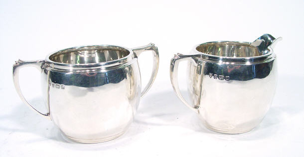 Appraisal: Art Deco style two handled silver sugar bowl and matching