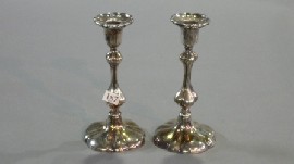 Appraisal: A pair of Victorian silver candlesticks of knopbbed form impressed