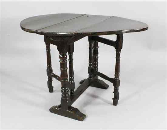 Appraisal: A Charles II oak oval gateleg table late th century