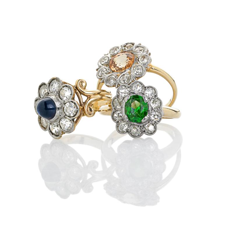 Appraisal: EDWARDIAN GEMSTONE AND DIAMOND CLUSTER RINGS Condition Report