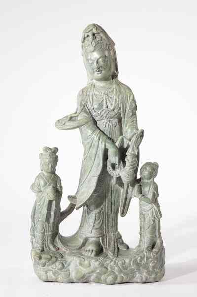 Appraisal: Large Chinese Stone Sculpturedepicting a standing Guanyin with fine incised