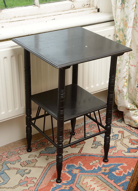 Appraisal: A VICTORIAN EBONISED AESTHETIC MOVEMENT OCCASIONAL TABLE after a design