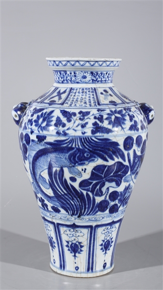 Appraisal: Chinese blue and white porcelain vase with a fish motif