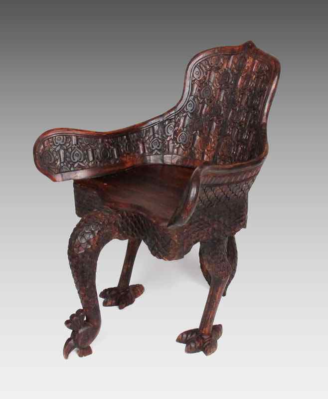 Appraisal: NICELY DETAIL CARVED FIGURAL PEACOCK CHAIR ''h ''w wing arm