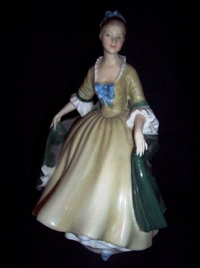 Appraisal: A Royal Doulton figure Elegance HN cm high