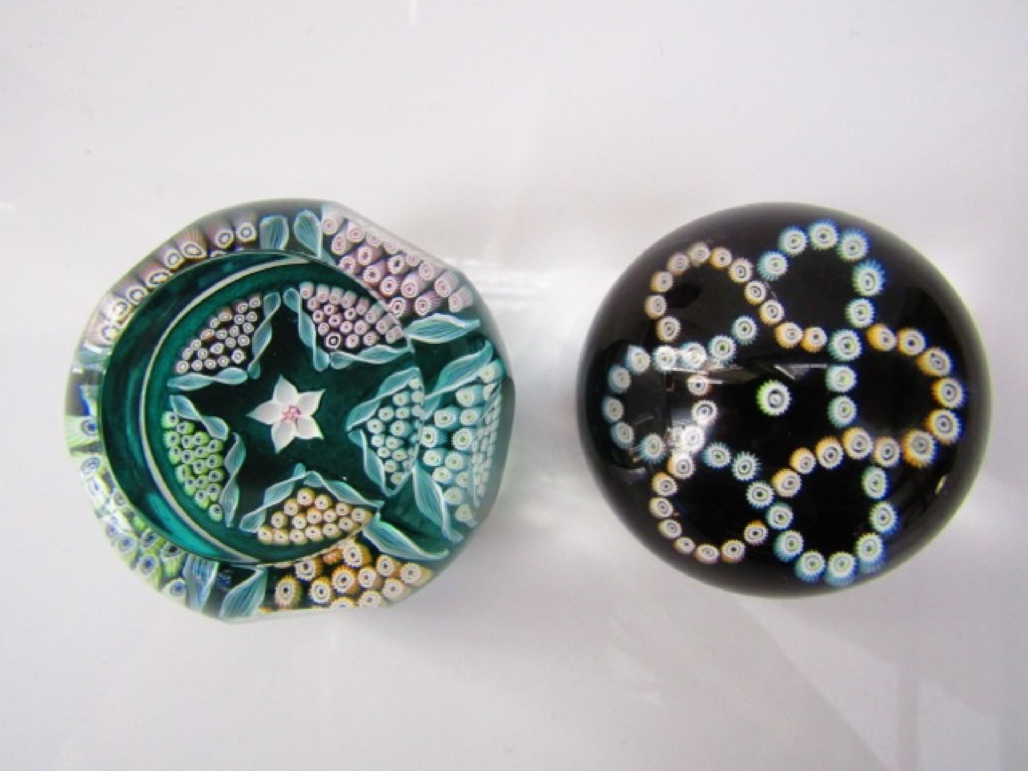 Appraisal: Two boxed Edinburgh Millefiori paperweights one of rounded form with