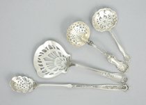 Appraisal: Four Sterling Silver Pierced Servers This lot features four pierced