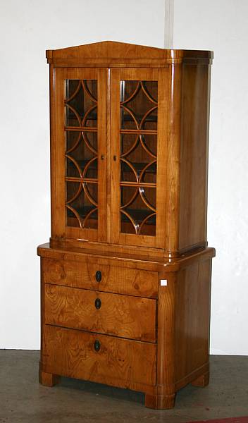 Appraisal: A Biedermeier birch and ash bookcase cabinet last half th