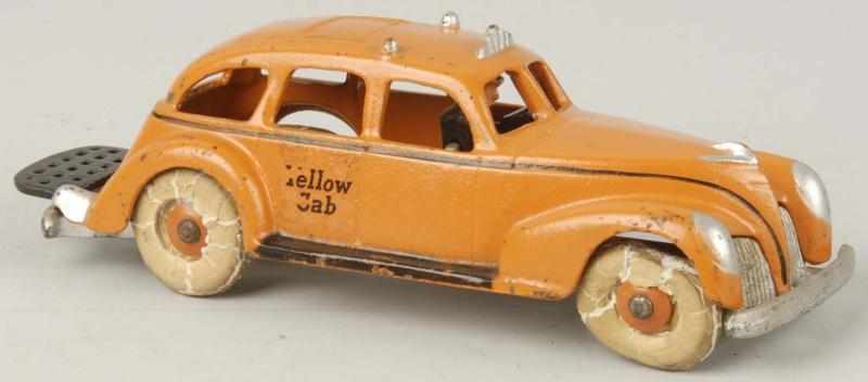 Appraisal: Cast Iron Hubley Yellow Cab Toy Description Original tailgate Molded