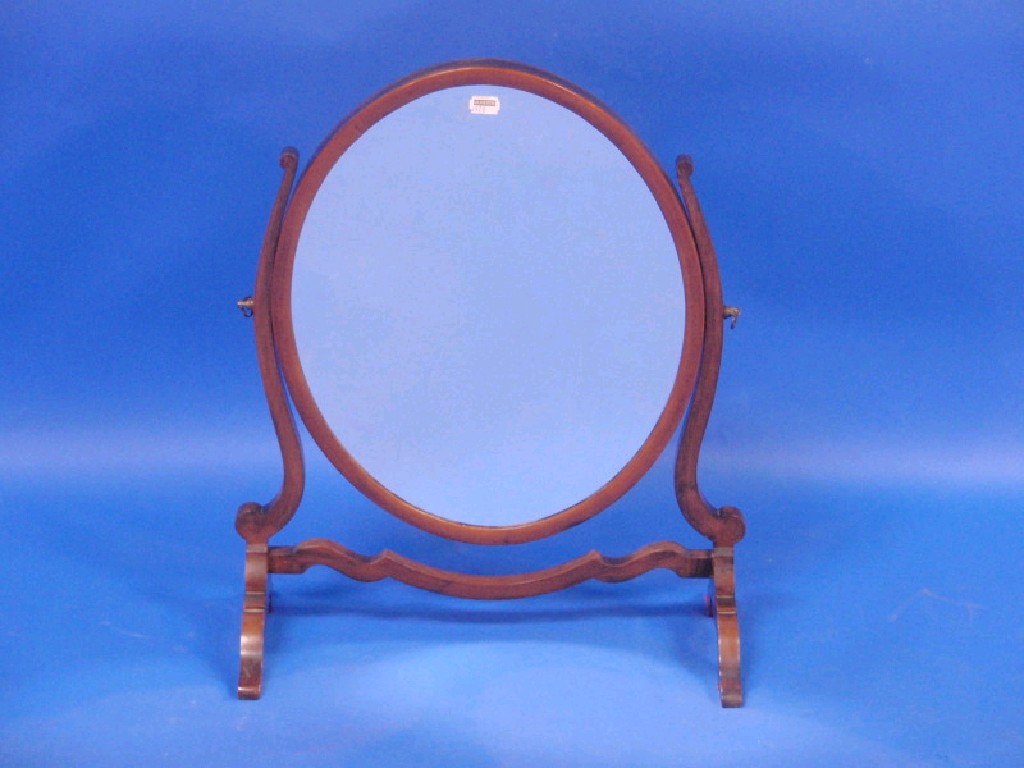 Appraisal: A Georgian style mahogany oval dressing table mirror