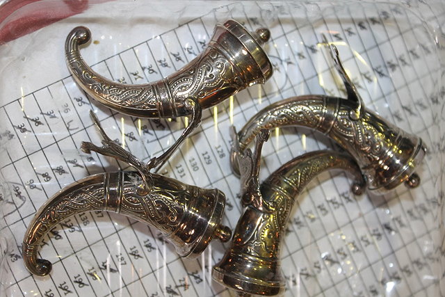 Appraisal: A SET OF FOUR NORWEGIAN SILVER SALTS of horn shaped