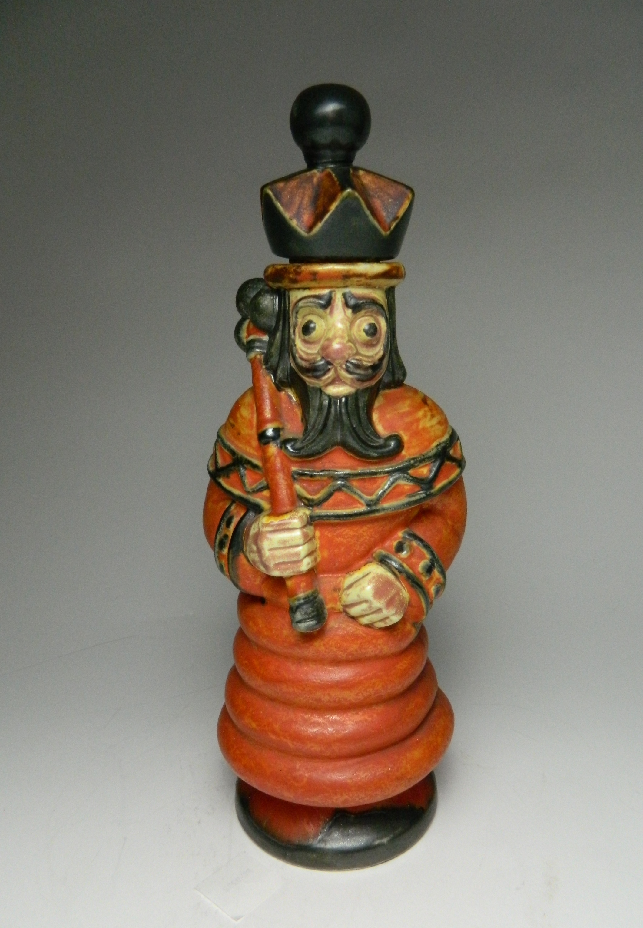 Appraisal: Cowan pottery 'Alice Through The Looking Glass' standing King decanter