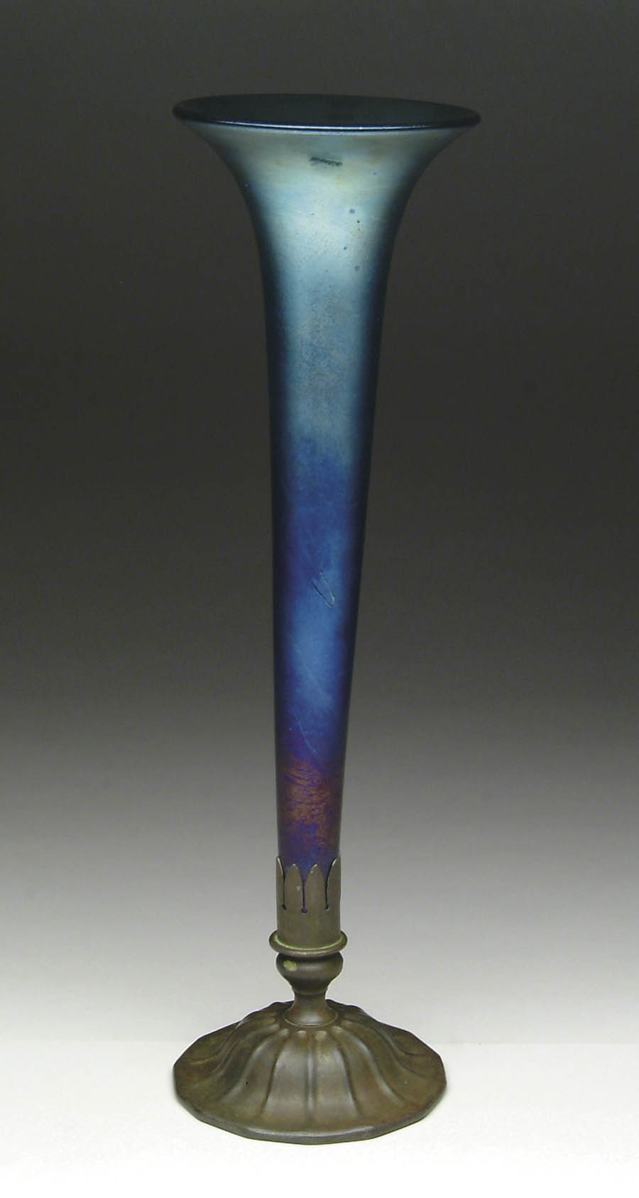 Appraisal: ART GLASS AND BRONZE VASE Large blue Favrile glass trumpet-shaped