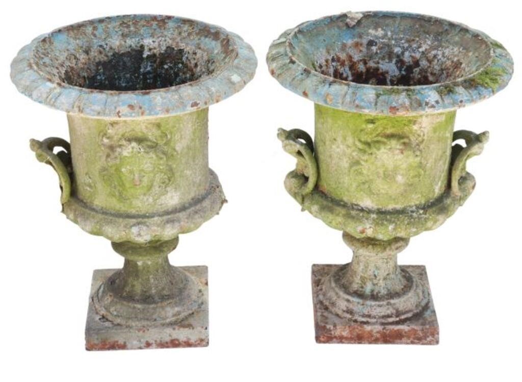 Appraisal: pair French cast iron campana-form garden urns rolled rim over