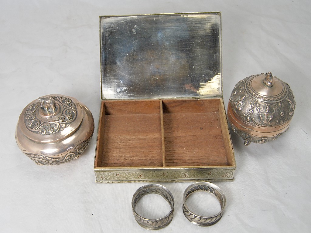 Appraisal: Two Burmese white metal pots and covers a pair of