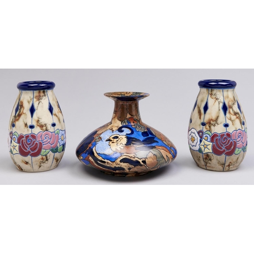 Appraisal: A pair of Continental pottery vases decorated in art deco