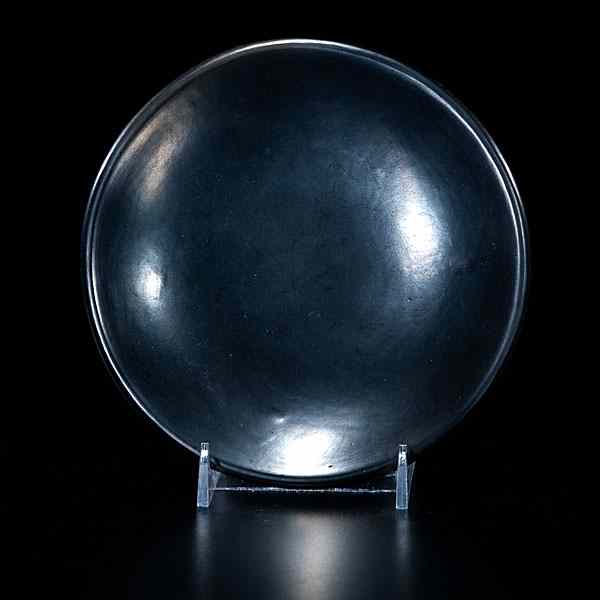 Appraisal: Maria Martinez San Ildefonso Blackware Plate unadorned gunmetal finish plate