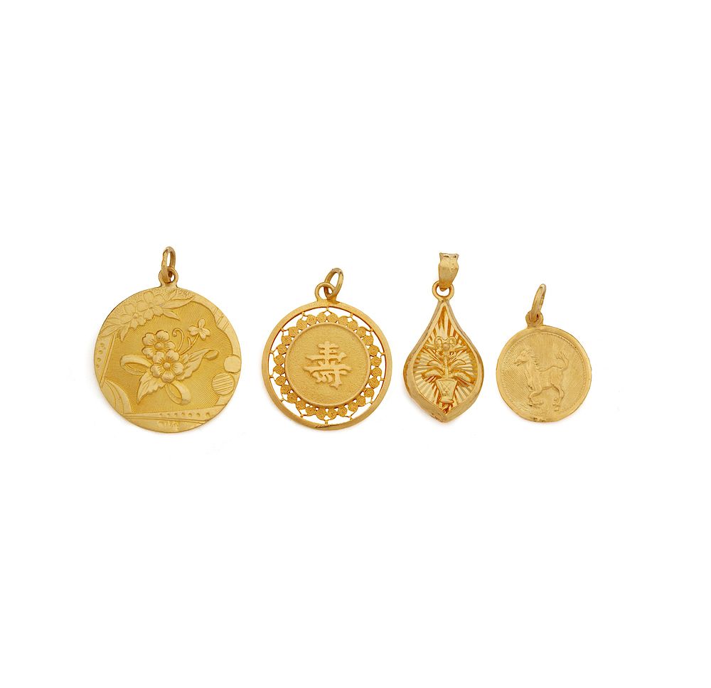 Appraisal: Four K Yellow Gold Pendants gm Four k gold pendants