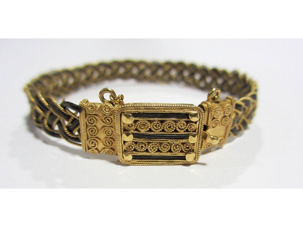 Appraisal: A Victorian high carat gold and elephant hair bangle attractively