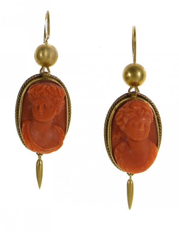 Appraisal: A PAIR OF ANTIQUE CORAL CAMEO EARRINGS carved with the