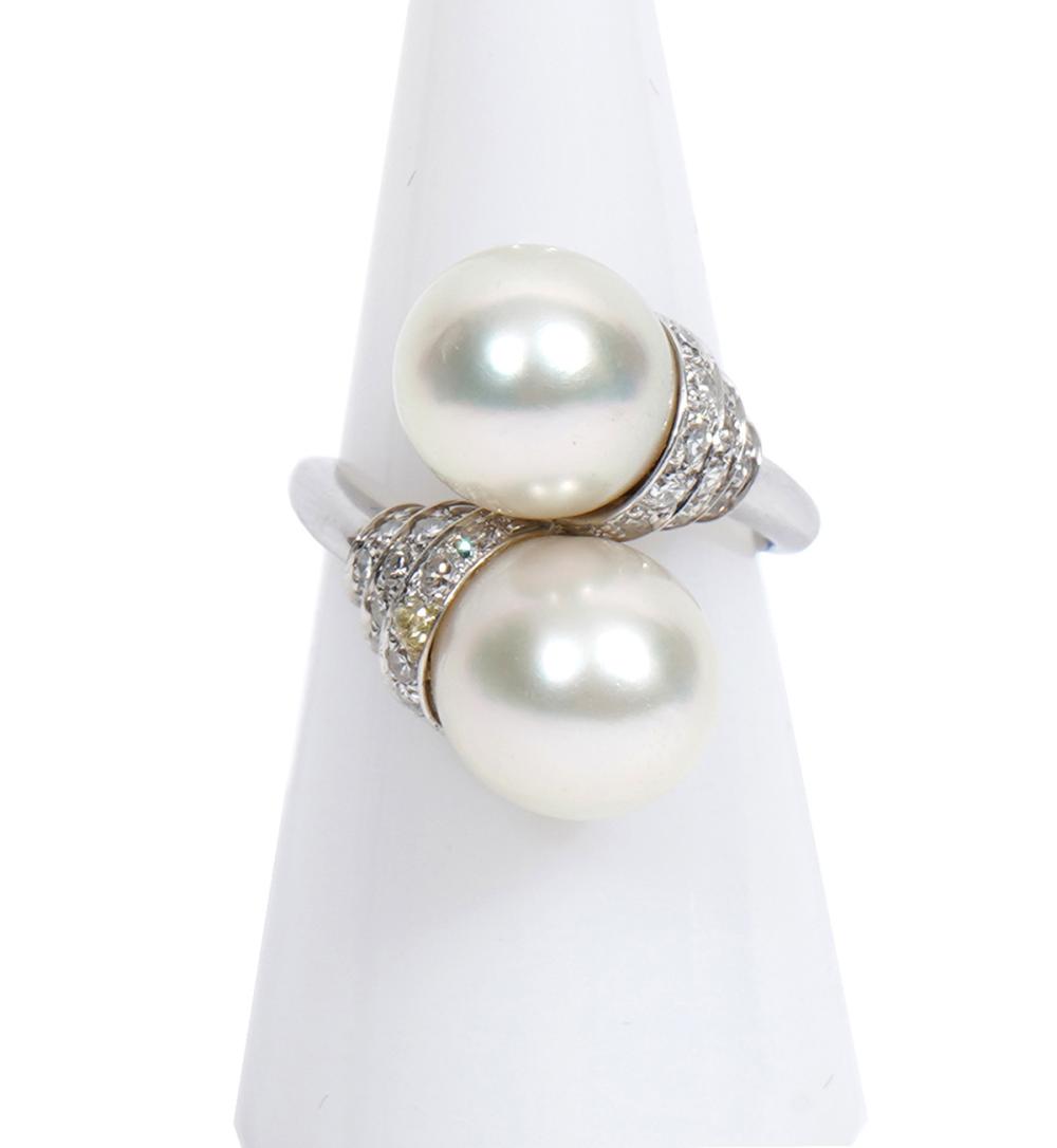 Appraisal: K WG PEARL DIAMOND BYPASS RING K white gold Baroque