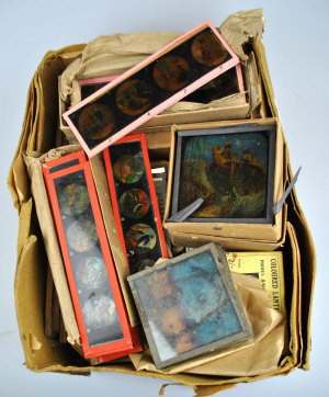 Appraisal: A quantity of magic lantern slides in original boxes titles