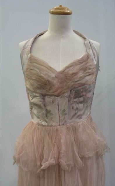 Appraisal: s ball gown in pink silk faille with net overskirt