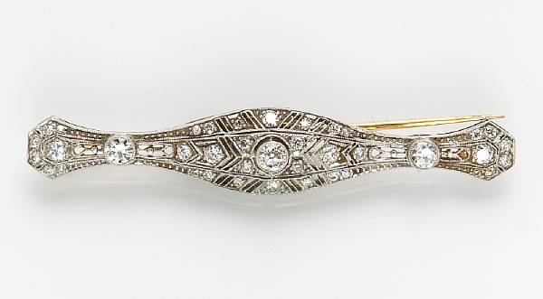 Appraisal: A diamond and platinum bar brooch estimated total diamond weight