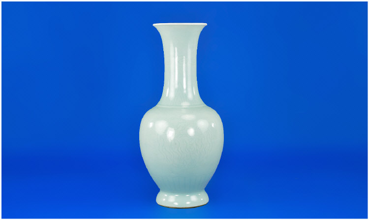 Appraisal: Celadon Glaze Baluster Vase with Dragon design in faint underglaze