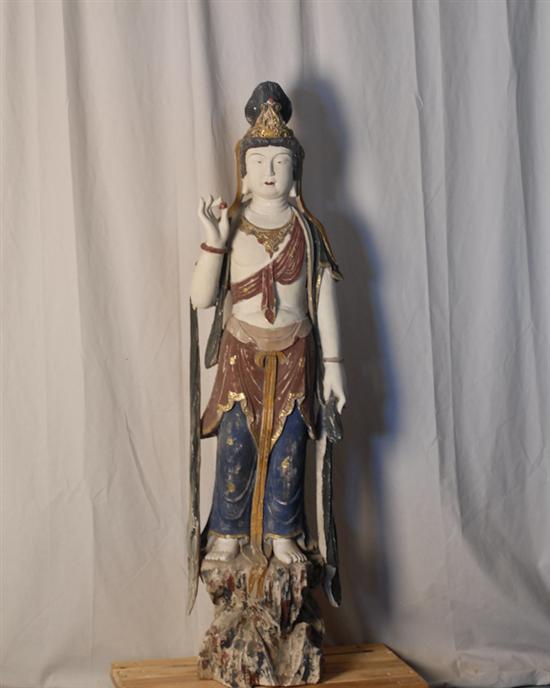 Appraisal: A Carved Wood and Polychromed Figure of Quan Yin standing