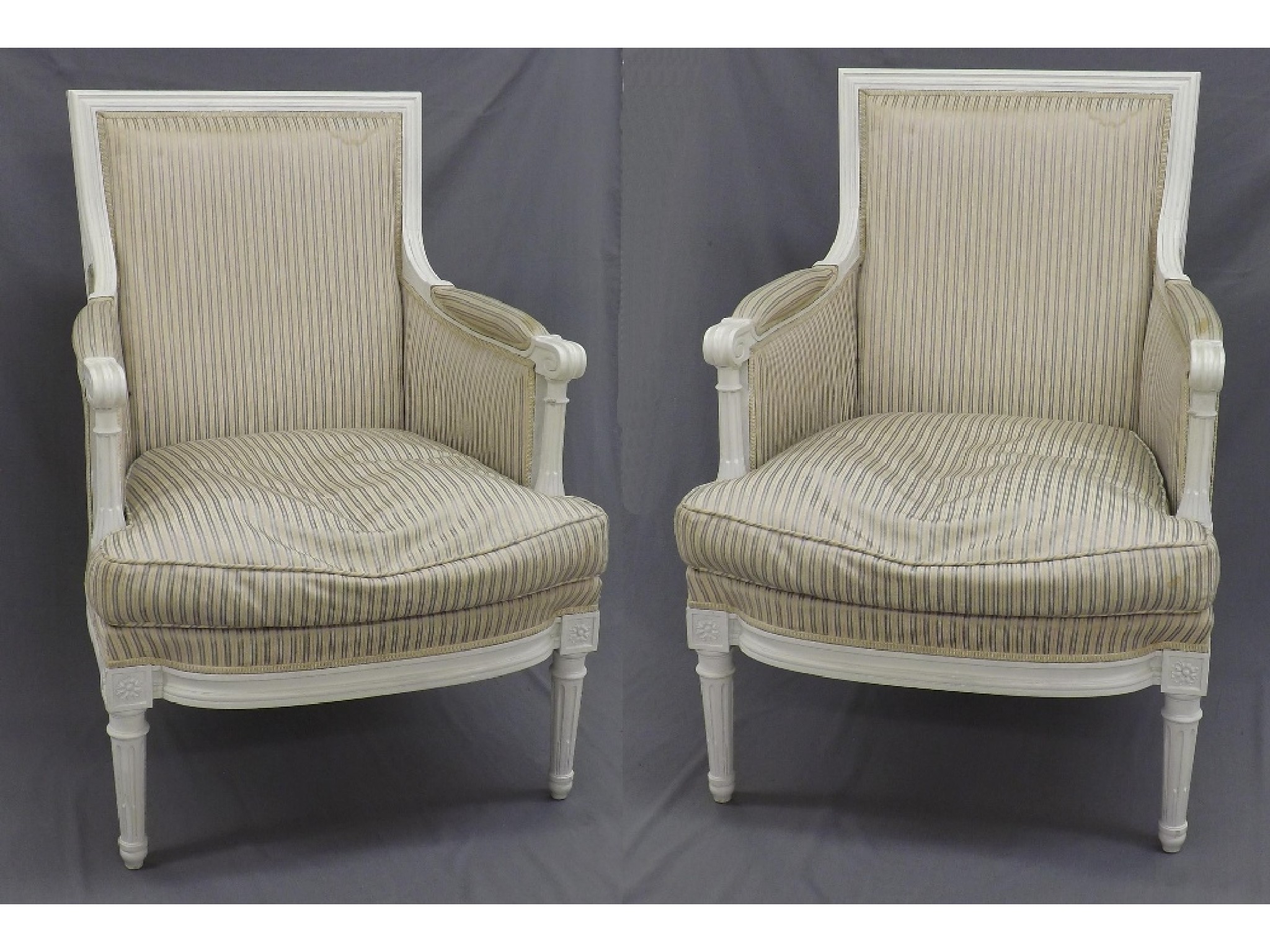 Appraisal: Decorative pair of French bedroom chairs with striped upholstery each