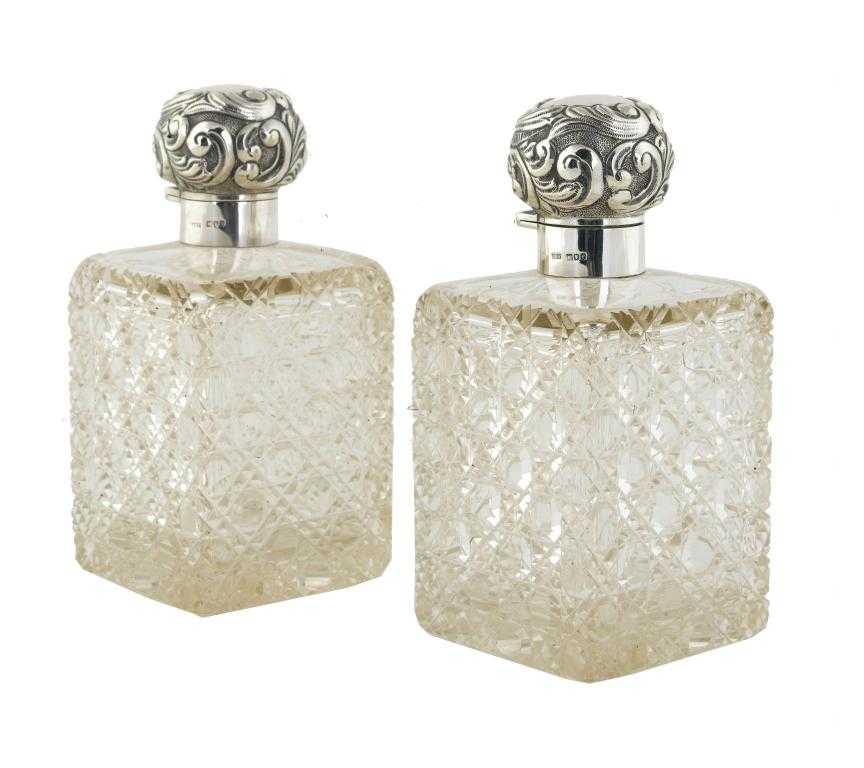 Appraisal: A PAIR OF EDWARD VII SILVER MOUNTED CUT GLASS SCENT