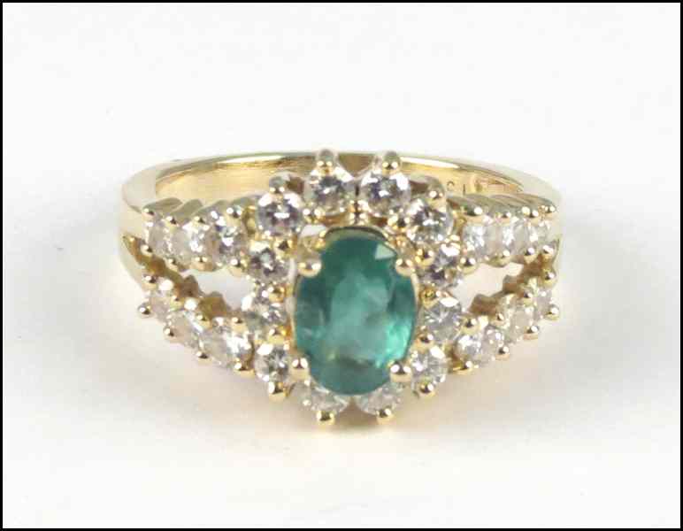 Appraisal: EMERALD DIAMOND AND KARAT YELLOW GOLD RING Comprised of one