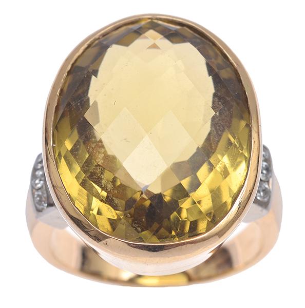 Appraisal: A CITRINE AND DIAMOND COCKTAIL RING Very minor wear to