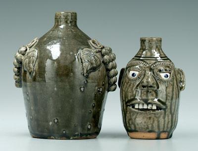 Appraisal: Two Georgia jugs face jug with incised eyelashes and eyebrows