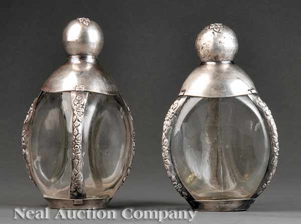 Appraisal: A Pair of Mexican Silver-Mounted Mold Blown Glass Decanters th